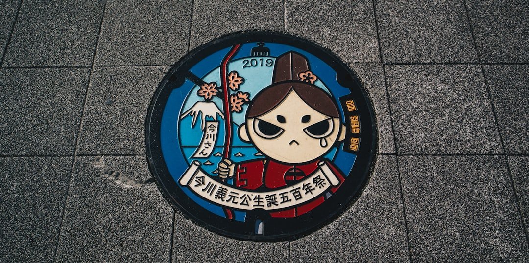 August 2021, Shizuoka.nColored manhole with local mascot design.